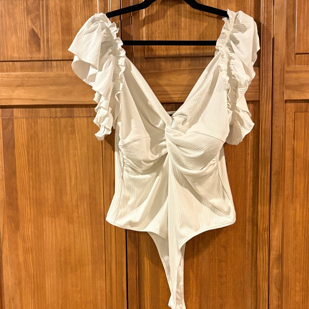 Lulu's White Ruffled Sleeve Bodysuit Twist Front